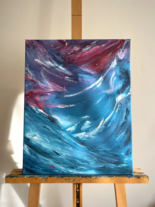 Tato abstraktní olejomalba zachycuje kontrast mezi světle modrou a růžovo červenou barvou. Kombinace těchto barev vytváří dojem pohybu a dynamiky. Obraz je příkladem, jak umění může vyjádřit intenzitu a emoce, aniž by se spoléhalo na konkrétní podoby.